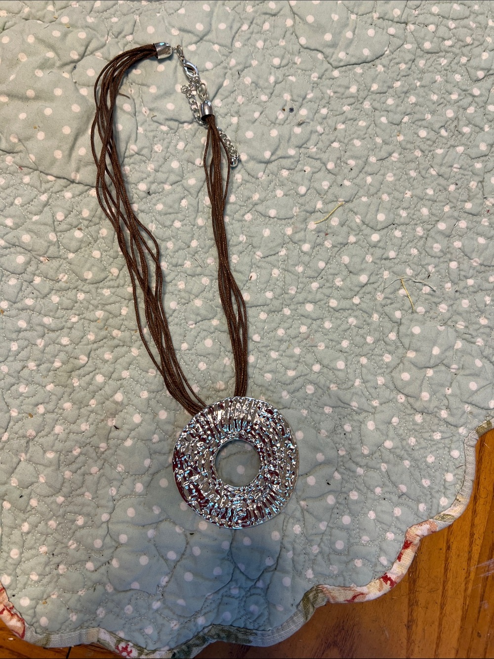 Silver-Tone Round Pendant Necklace with Brown Multi-Strand Cord